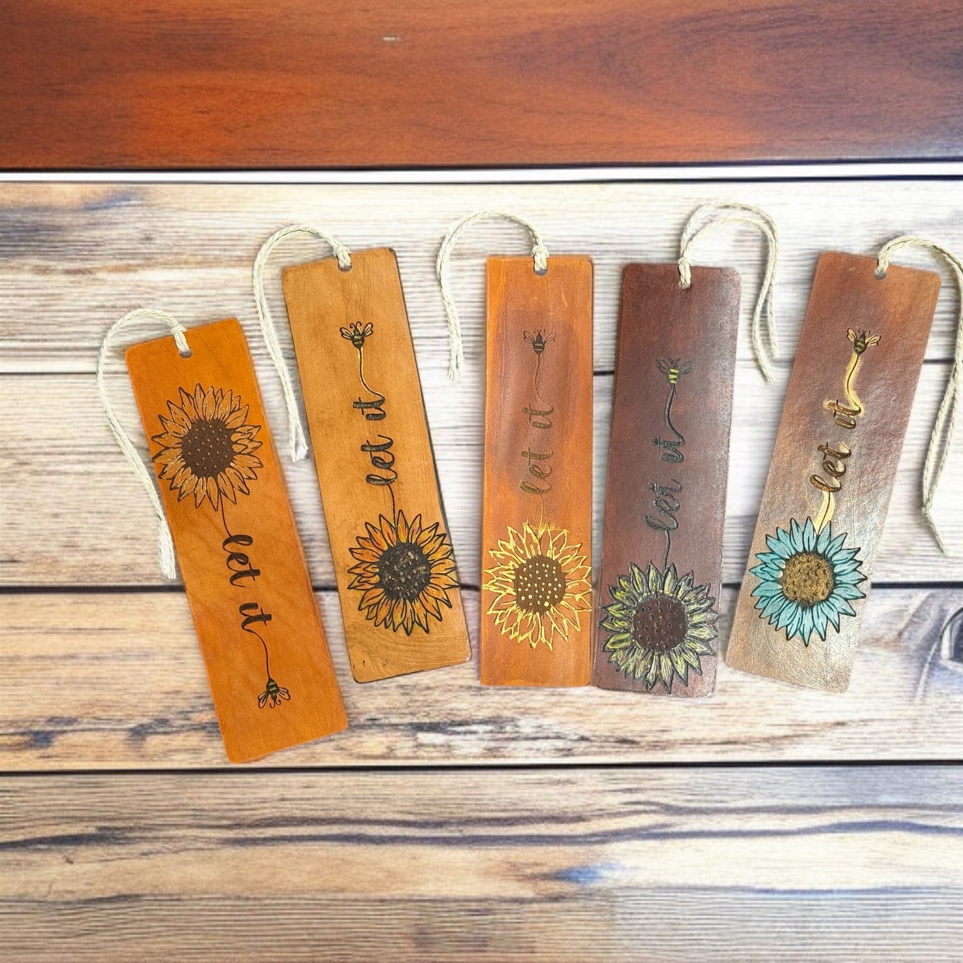 Leather bookmarks with engraved sunflowers and bees, hand-painted on rustic brown leather