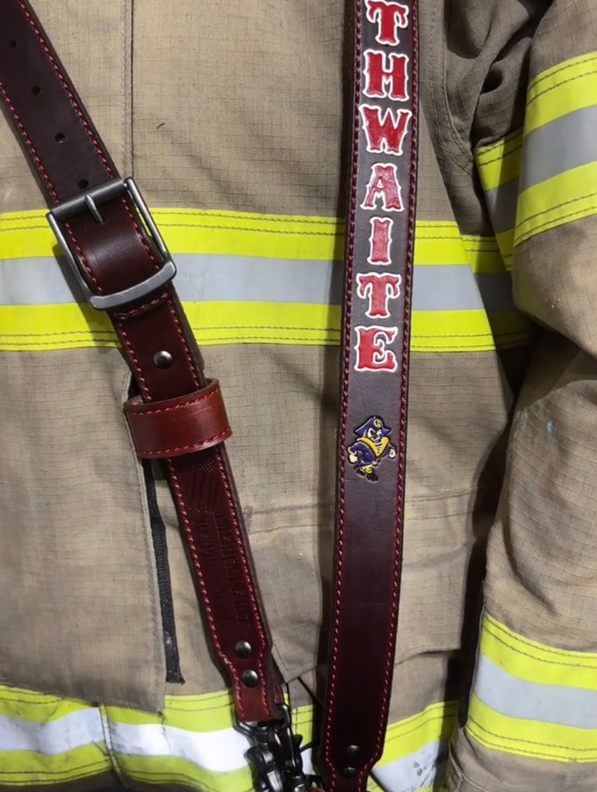 Brown custom leather firefighter radio straps with personalized names