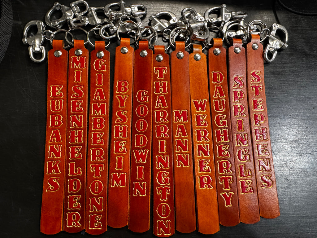 Custom leather SCBA quick release pulls personalized for firefighters, handmade in the USA from English bridle leather.