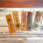 Leather bookmarks with engraved sunflowers and bees, hand-painted on rustic brown leather