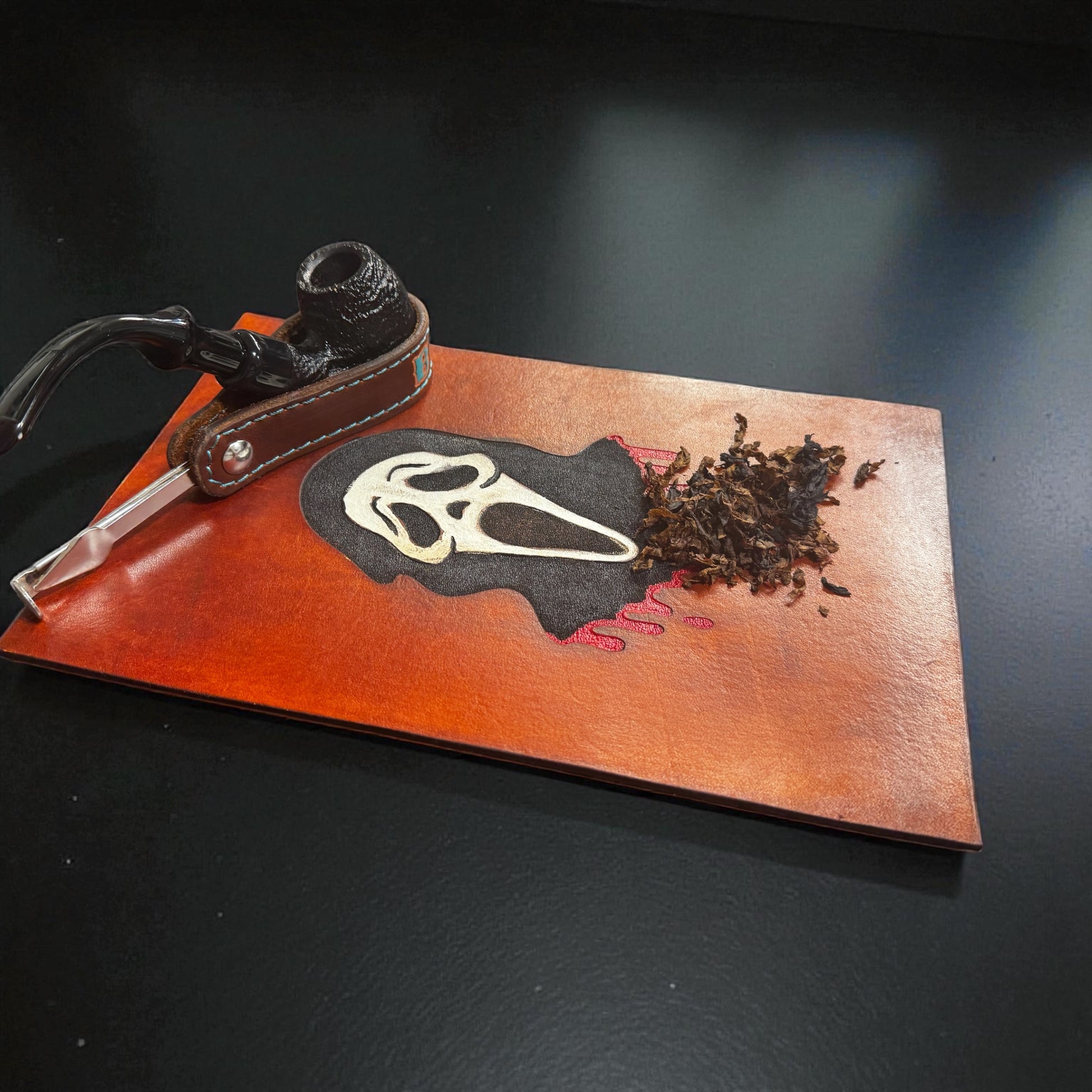Leather pipe prep pad with hand-painted artwork