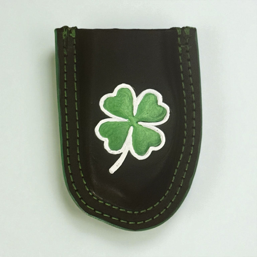 Leather shamrock Raptor Shears holster on white background
