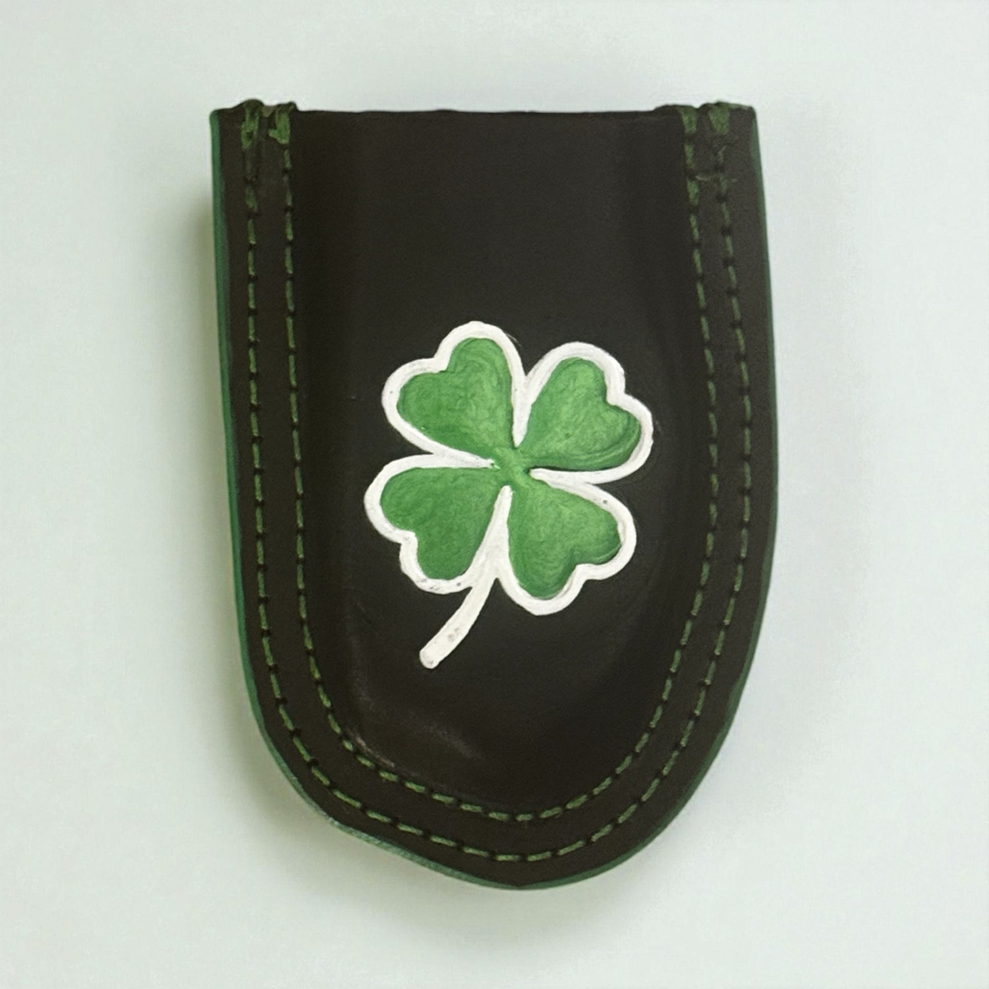 Leather shamrock Raptor Shears holster on white background