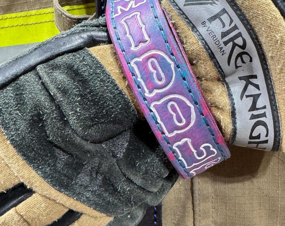 Personalized cotton candy firefighter glove strap made from hand-painted full-grain leather with custom name engraving.