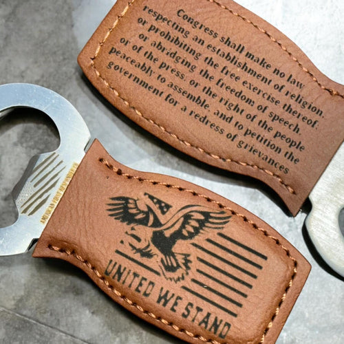 Leather-wrapped stainless steel bottle opener with full First Amendment text laser engraved, offering a comfortable grip and durable design, made in the USA by a first responder-owned business.